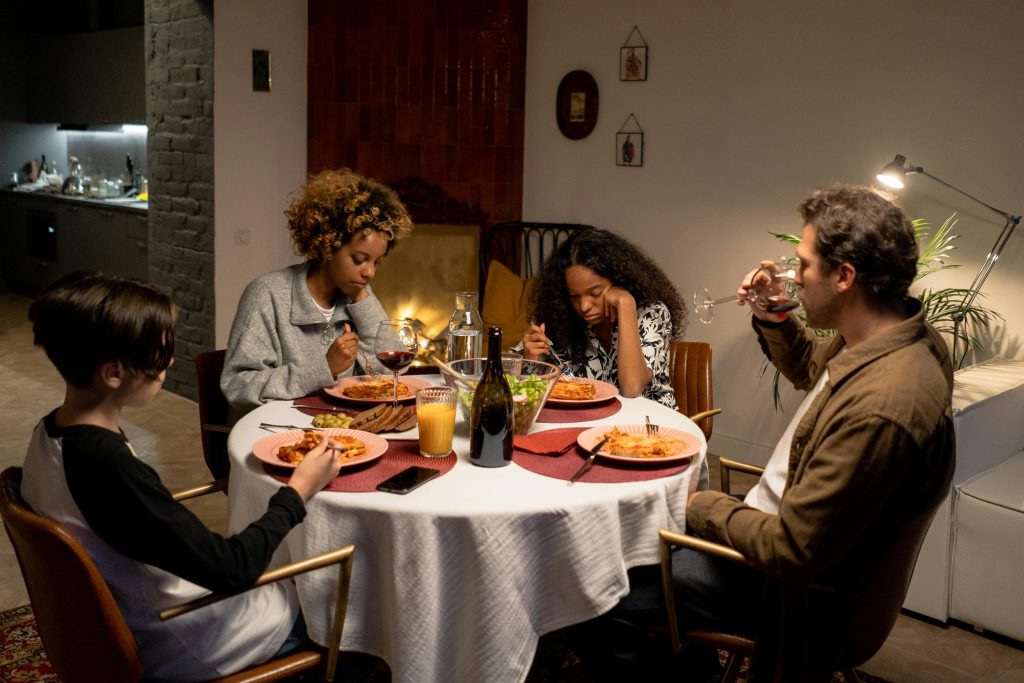 Family seated around dinner table